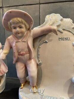 Pair of porcelain menu doors Little boy / little girl very good condition intact