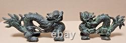 Rare pair of patinated bronze dragons China 19th century very good condition