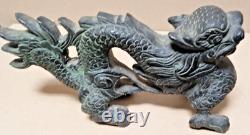 Rare pair of patinated bronze dragons China 19th century very good condition