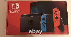 Console Nintendo Switch Neon, 32 Go, joy-con bleu et rouge Très Bon Etat