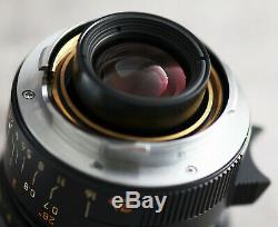 Leica 24 mm 2.8 Elmarit-M ASPH (11878) + Hood (12592) Très bon état