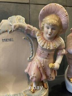 Paire de porte menu Porcelaine petit garçon / petite fille très bon état intacte